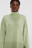 Maglione a maglia di dolcevita verde chiaro di grandi dimensioni