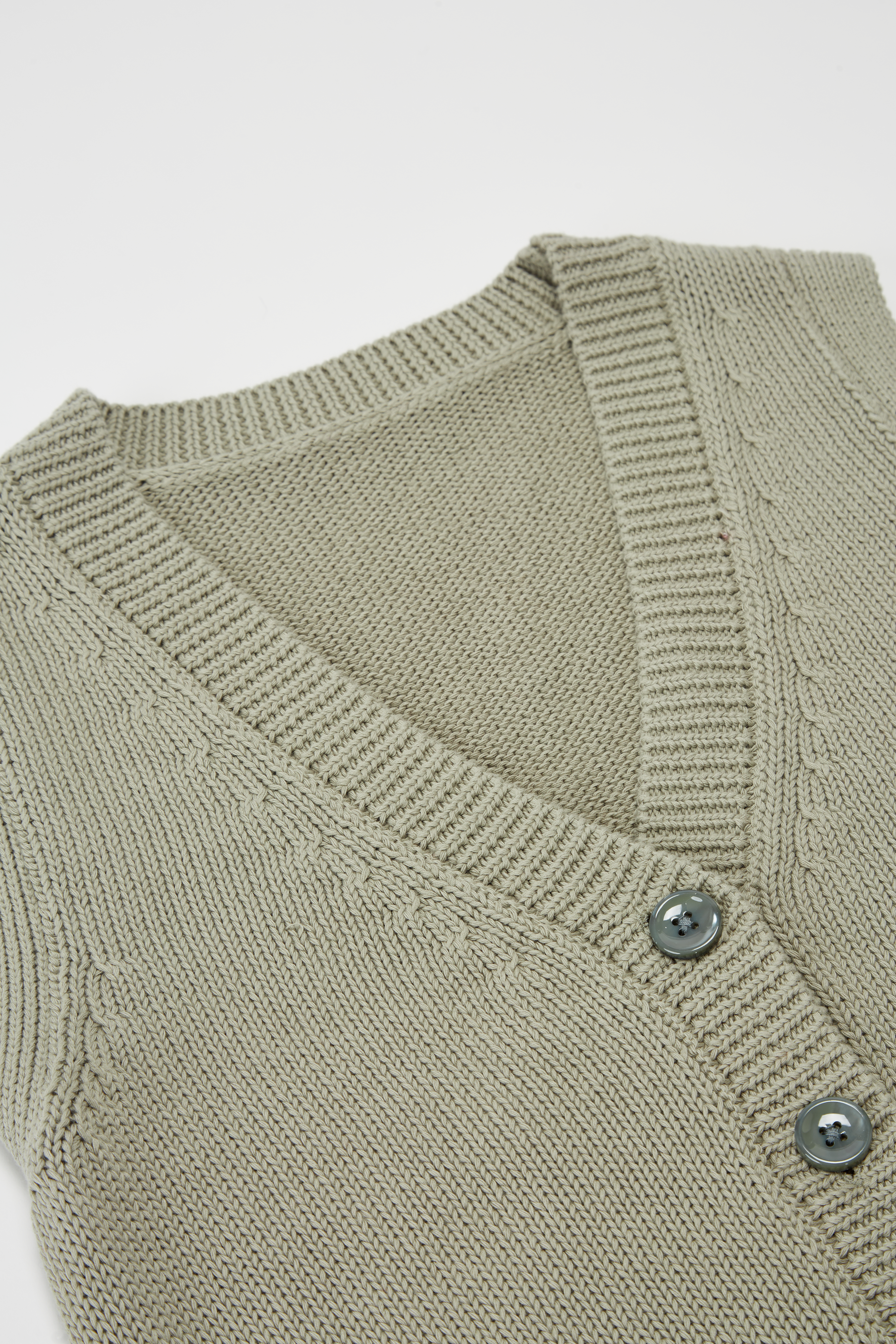 Match Celadon con bottoni